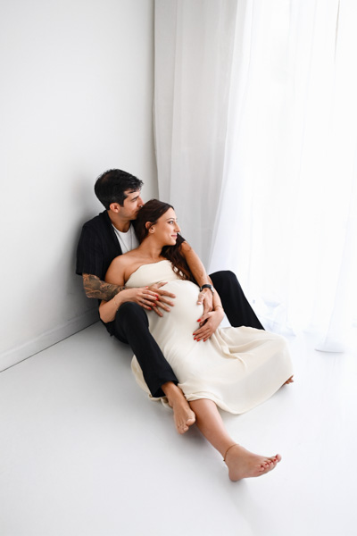 Pregnant woman by the window