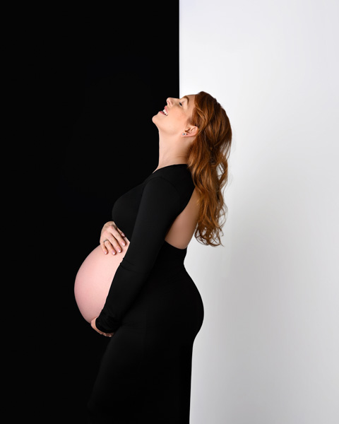 Pregnant woman by the window