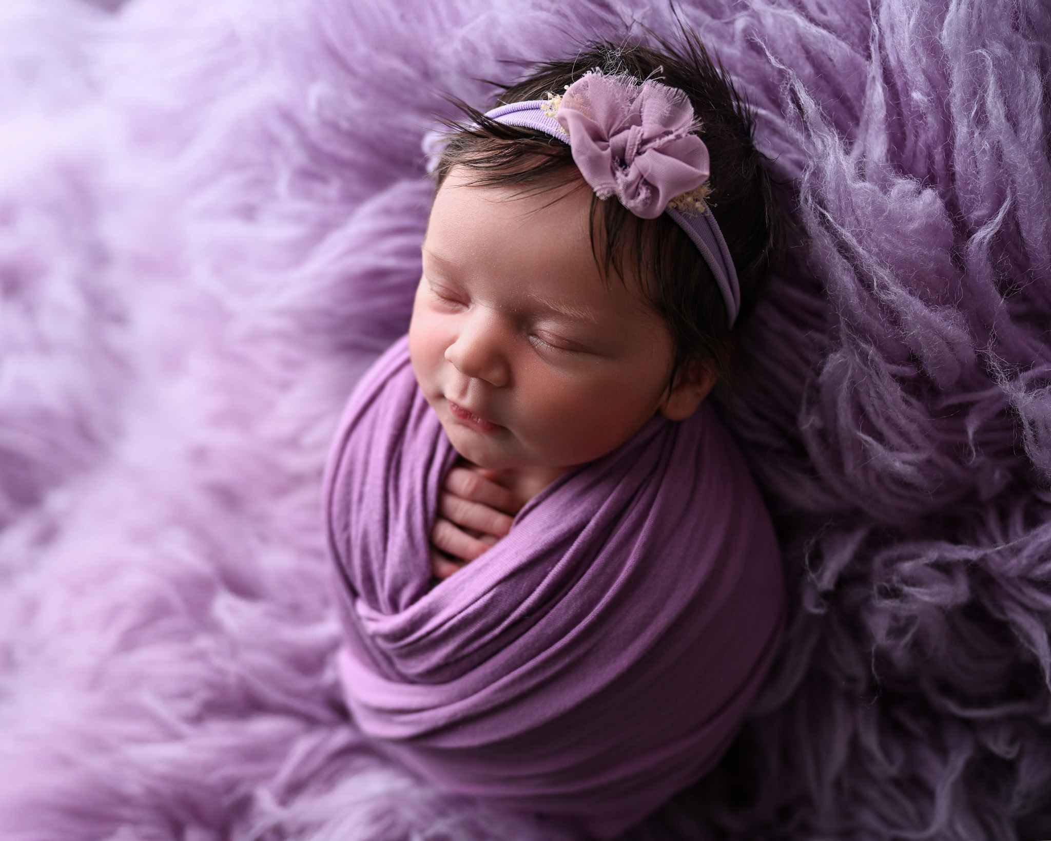 Peaceful newborn photography session setup
